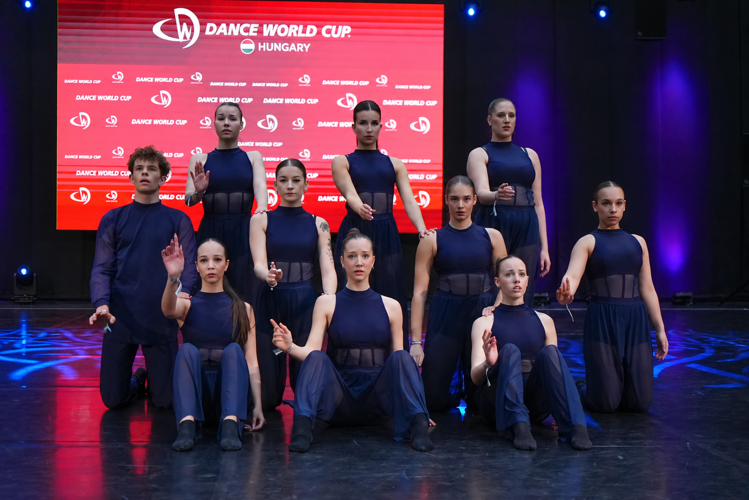 Dancers performing on stage at Dance World Cup Hungary