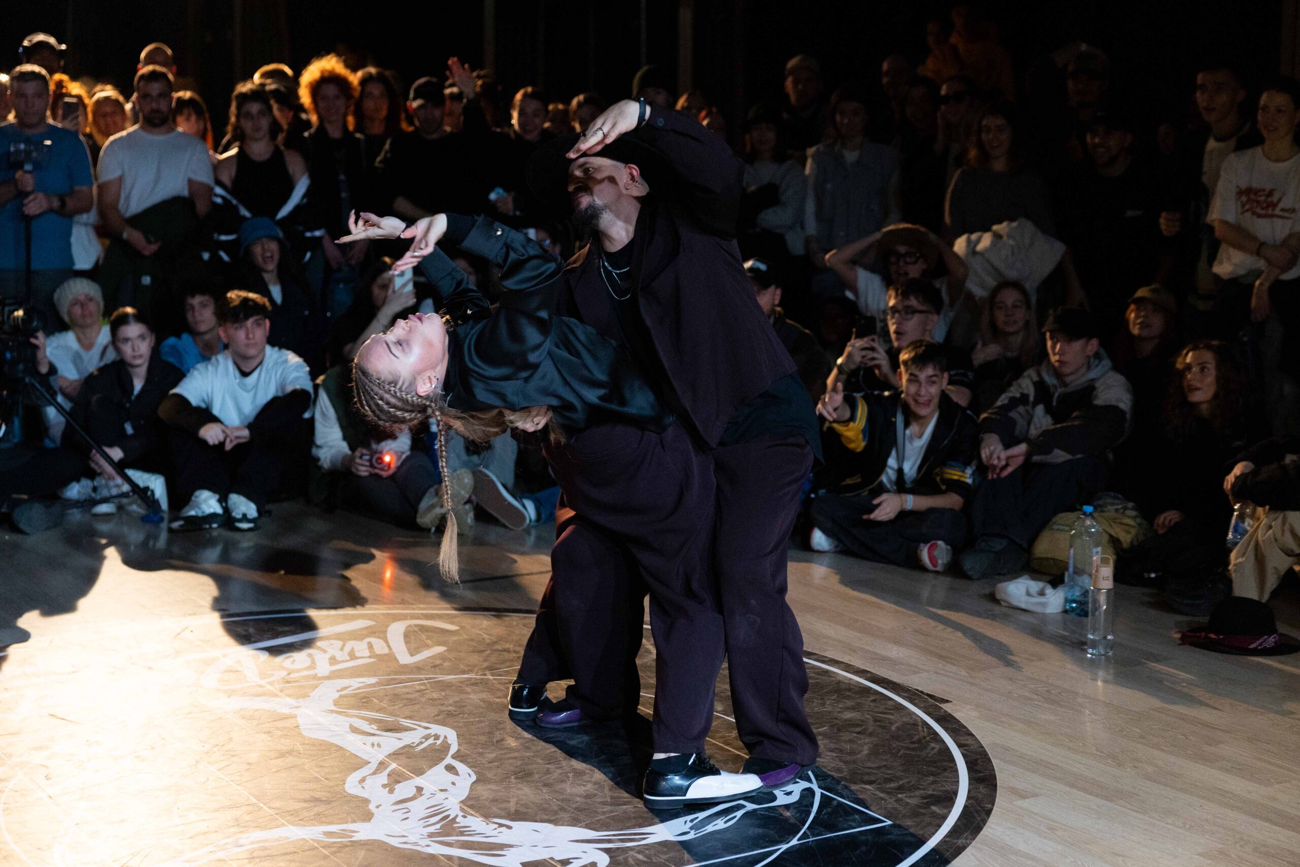 Dancers performing at Juste Debout Bucharest surrounded by spectators